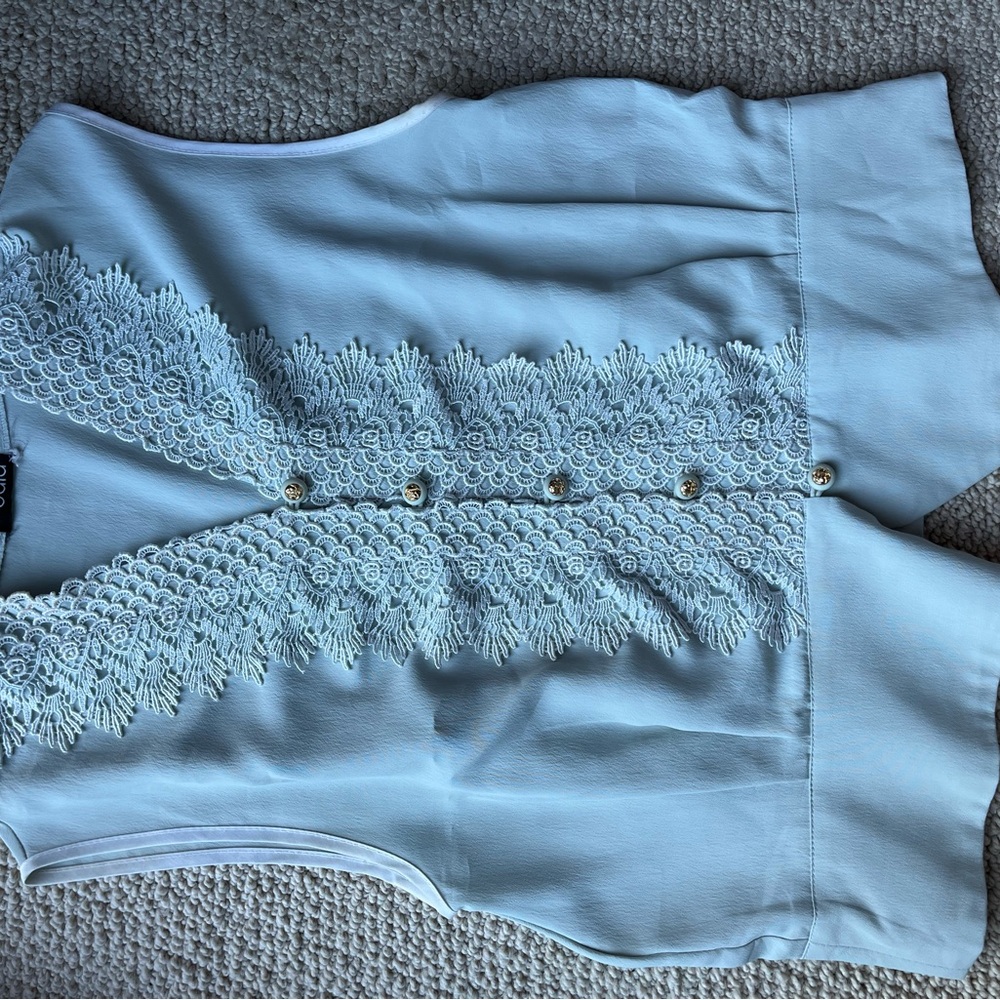 Elegant Light Blue Sleeveless Blouse